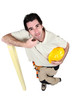 woodworker leaning on a board