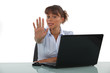 woman making a stop sigh with her hand