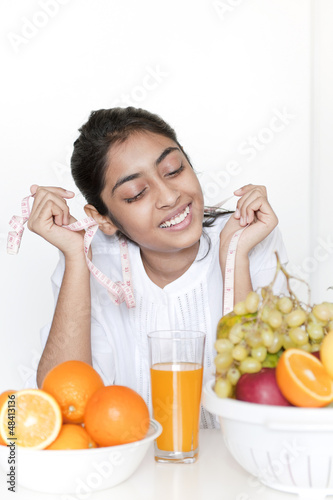 Photo: Pretty girl with fruits Pretty girl with fruits