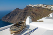 Boat and Imerovigli, Santorini island