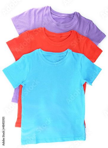 Photo: Blue t-shirt isolated on white Blue t-shirt isolated on white