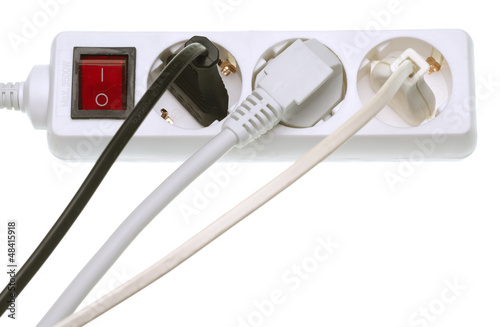 Photo: Power strip multiple electrical cords plugged in Power strip multiple electrical cords plugged in