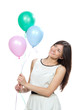 girl with colorfull balloons as a present for birthday party
