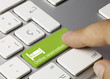 Online reservation keyboard key. Finger