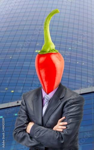 Photo: Businessman with chili pepper instead of head Businessman with chili pepper instead of head