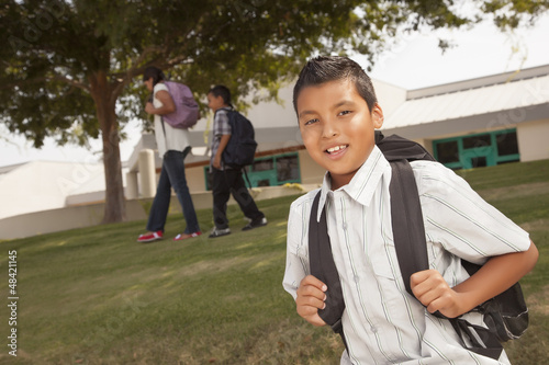 Photo: Happy Young Hispanic Boy Ready for School Happy Young Hispanic Boy Ready for School
