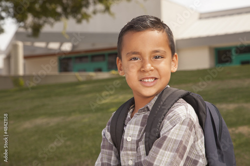 Photo: Happy Young Hispanic Boy Ready for School Happy Young Hispanic Boy Ready for School