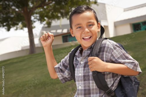 Photo: Happy Young Hispanic Boy Ready for School Happy Young Hispanic Boy Ready for School