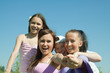 Two happy mothers with teens