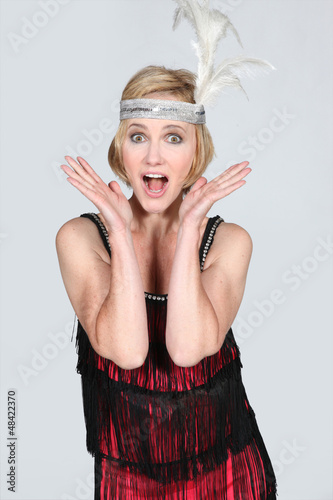 Photo: Woman with a feather headband Woman with a feather headband