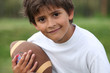 Photo: Child with rugby ball Child with rugby ball
