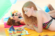 Young lying on the beach