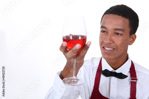 Photo: Looking glass of wine waiter Looking glass of wine waiter