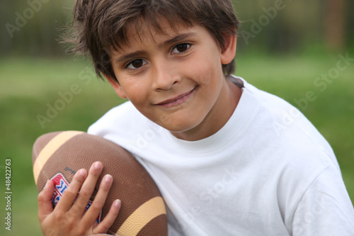 Photo: Child with rugby ball Child with rugby ball