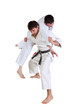 Photo: Karate. Men in a kimono with a white background. Karate. Men in a kimono with a white background.