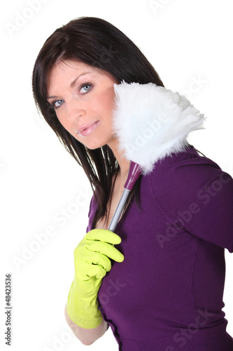 Photo: Woman with feather duster Woman with feather duster
