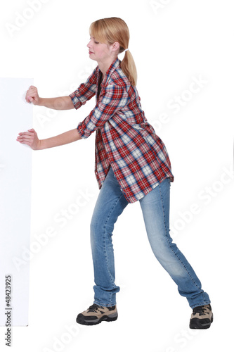 Photo: Woman pretending to push Woman pretending to push
