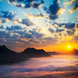 Sea of clouds on sunrise with ray lighting