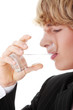 Businessman with glass of water