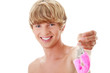Young attractive caucasian man with pink handcuff