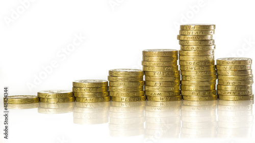 Photo: Uk pound coins stacked Uk pound coins stacked