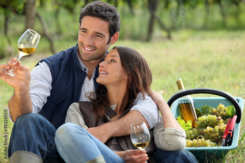 Photo: couple enjoying picnic couple enjoying picnic