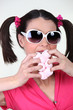Photo: Silly woman scarfing down marshmallows Silly woman scarfing down marshmallows