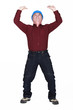 mature manual worker lifting weight