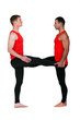 Two male gymnasts stretching