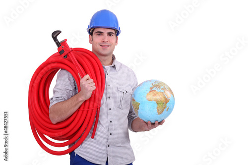 Photo: Worker with globe and wrench Worker with globe and wrench
