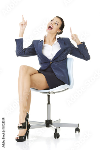 Photo: Businesswoman showing copy space Businesswoman showing copy space