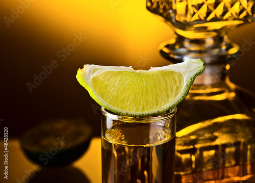 Photo: gold tequila and lime gold tequila and lime