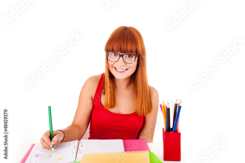 Photo: University girl holding a school bag and smiling University girl holding a school bag and smiling