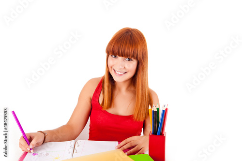 Photo: University girl holding a school bag and smiling University girl holding a school bag and smiling