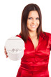 Beautiful woman holding presents while smiling