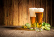 Glass of beers on wooden table