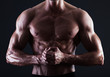 Photo: Muscular male torso with lights showing muscle detail Muscular male torso with lights showing muscle detail