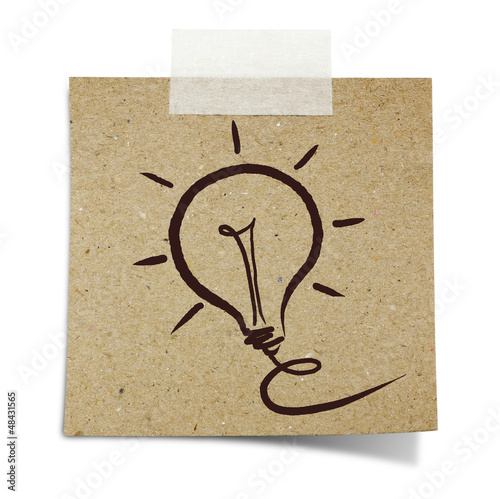 Photo: hand draw light bulb on note taped recycle paper hand draw light bulb on note taped recycle paper