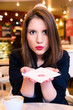 Photo: woman is flirting in modern cafe woman is flirting in modern cafe