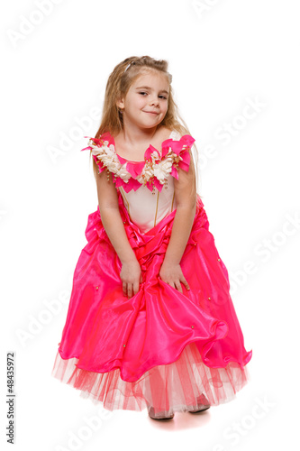 Photo: Flirty 6 years old girl in pink princess dress Flirty 6 years old girl in pink princess dress