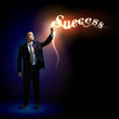 Businessman with light shining