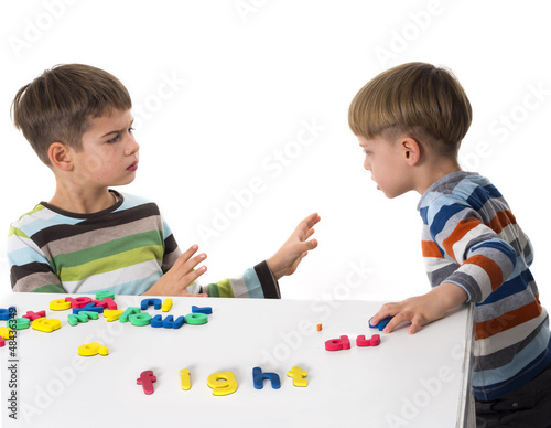 Photo: two boys fighting two boys fighting