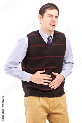 Photo: Young man having a stomach ache Young man having a stomach ache