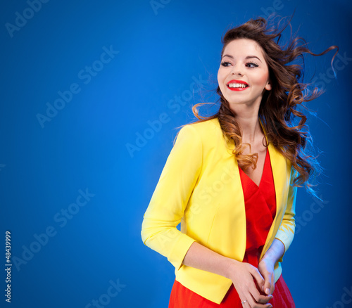 Photo: Colorful fresh portrait of a beautiful happy young woman Colorful fresh portrait of a beautiful happy young woman