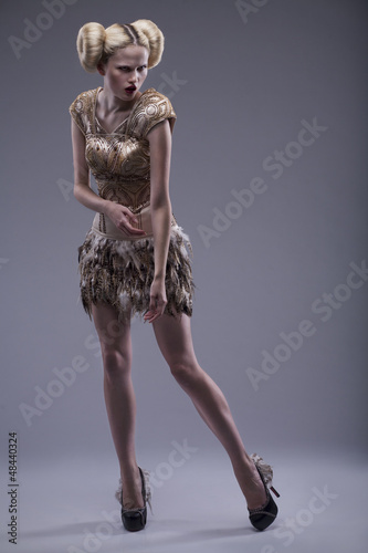 Photo: beautiful caucasian woman in gorgeous dress beautiful caucasian woman in gorgeous dress