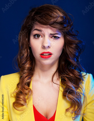 Photo: Unhappy woman looking with negative expression and disapproval. Unhappy woman looking with negative expression and disapproval.