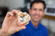 Dental technician presenting dental prosthesis
