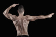 muscled man on a black background
