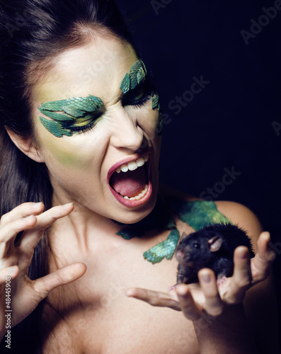 Photo: woman snake with rat woman snake with rat
