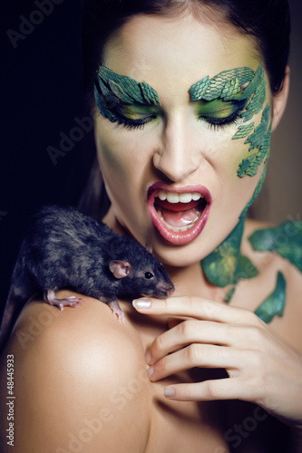 Photo: woman snake with rat woman snake with rat